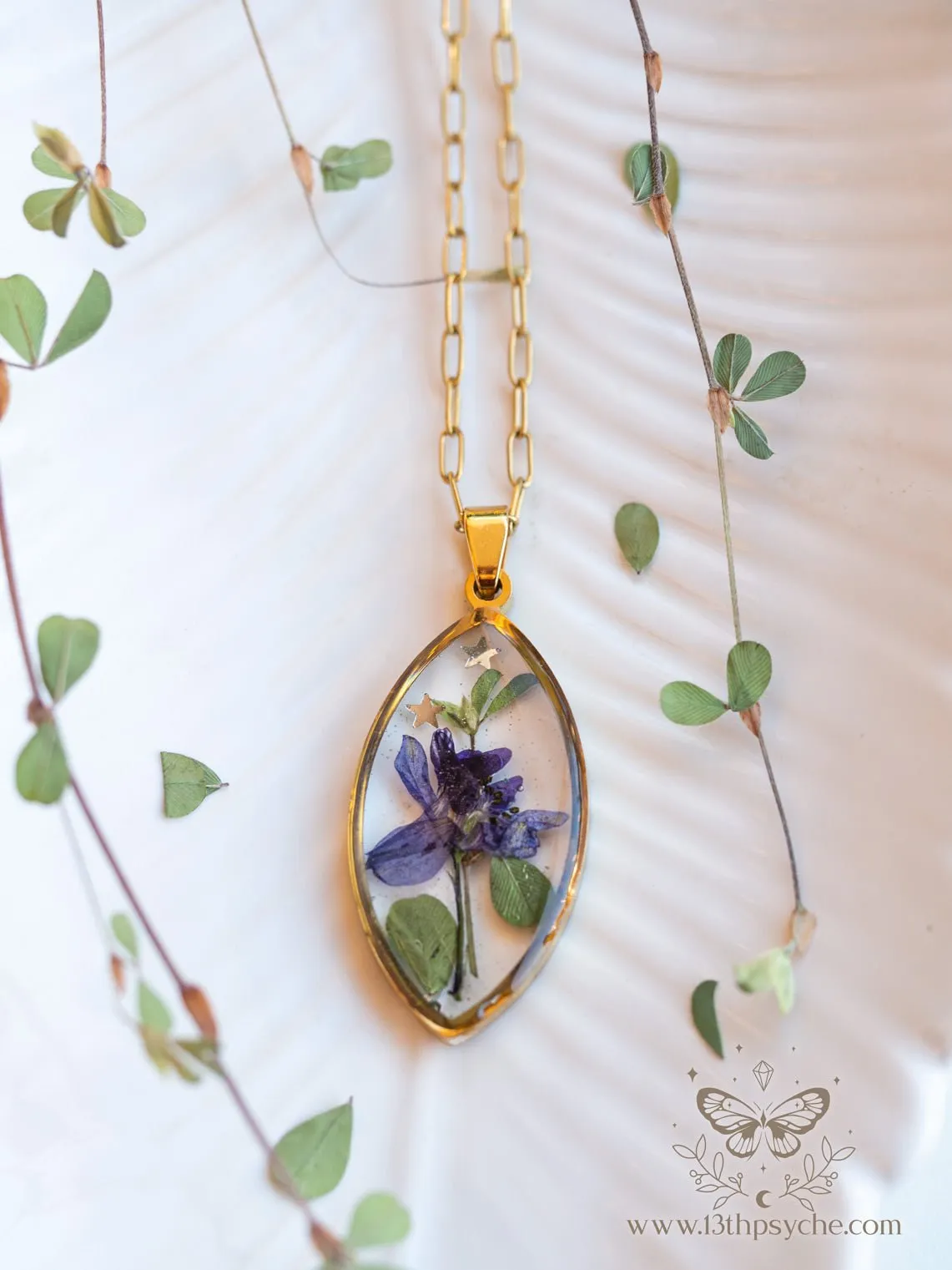 Blue pressed flower resin pendant necklace