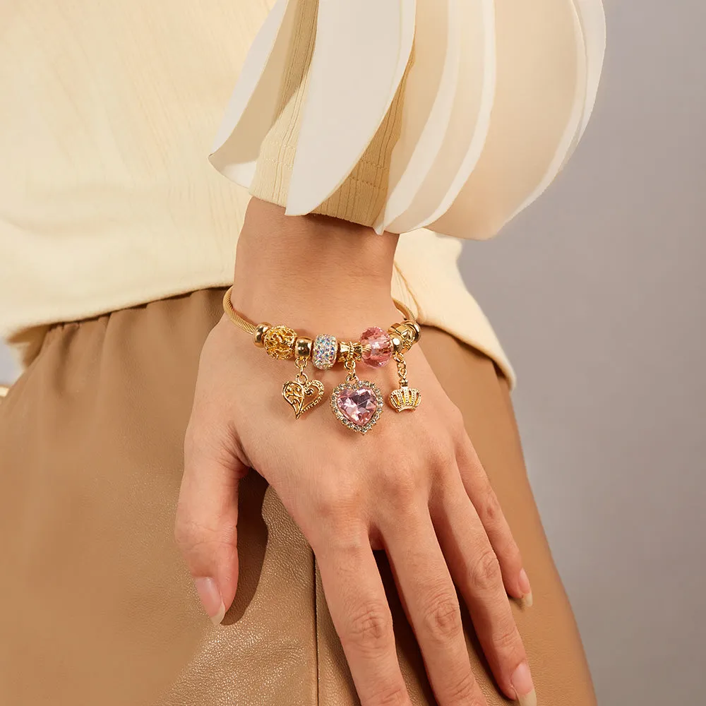 Gold Charm Bracelet for Women with Pink Heart and Crown Charms - Elegant and Stylish Jewelry for Any Occasion